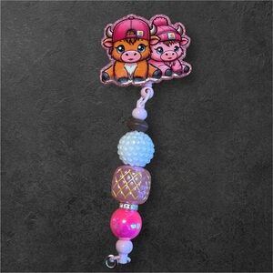 Adorable Pink and Brown Carhartt Highland Cow beaded badge reel.